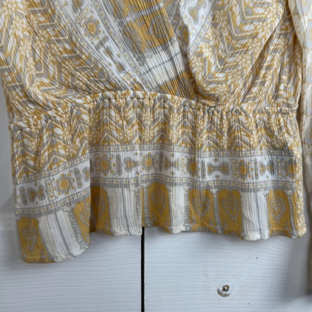 Free People Smocked Peplum‎ Blouse S Yellow Boho Ruffle Sleeve Wrap Top